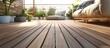 © Lasvu - WPC decking boards on a terrace with space for a banner.