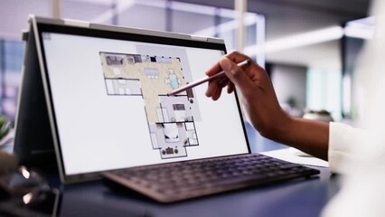 Sticker - Female Architect Using Digital Tablet to Analyze Floor Plan