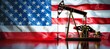 © Hero Design - Oil fuel pumpjack with America flag background. Fuel energy industry. 4th of July or American independence day. Generative AI technology.