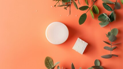 Poster - Minimalistic eco cosmetic jar with soap on orange background creative flat lay composition