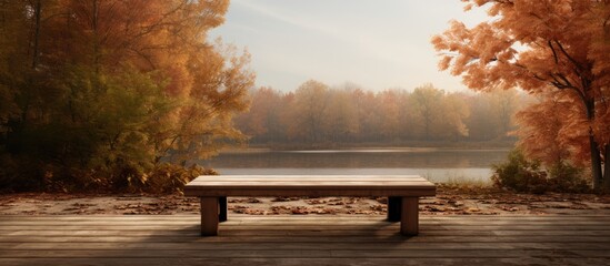 Wall Mural - Autumn scenery featuring a wooden table with a vacant area for product presentation in an outdoor setting. with copy space image. Place for adding text or design