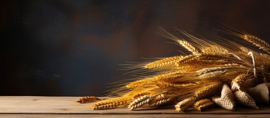 Fototapete - Wheat ears displayed on a table for design purposes with a copy space image.