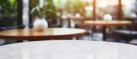 Aufkleber - Marble table empty with blurred people in a coffee shop background, ideal for product display or online advertising, with copy space image.