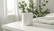 © Oleksiy - Ceramic mug on white bedside table indoors. Mockup for design