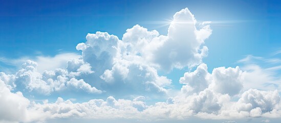 Wall Mural - sunny day with a blue sky filled with fluffy white clouds, ideal for the perfect copy space image.
