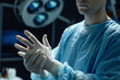 © Seventyfour - Cropped shot of surgeon wearing protective gloves preparing for surgery in operating room copy space