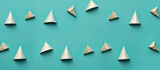 Aufkleber - Flat lay top view of a minimal creative cone frame arrangement pattern on a colored background for a Christmas-themed image with copy space.