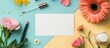 © vxnaghiyev - A composition featuring a blank card, makeup products, and flowers on a colorful backdrop with copy space image.