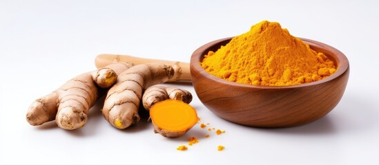 Poster - Top view of turmeric powder in a wooden bowl and turmeric root isolated on a white background with copy space image, laid flat.