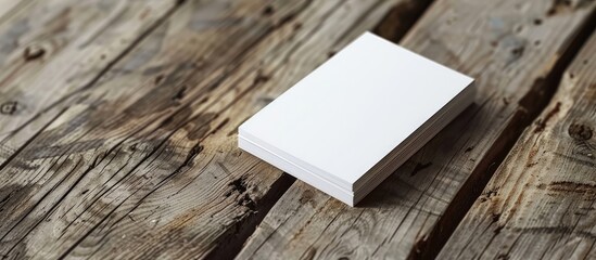 Leinwandbilder - Close-up shot of a white business card on a wooden surface, suitable for branding, with available copy space image for customization.