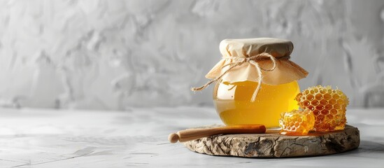 Aufkleber - Jar of honey and honeycombs displayed on a bright table with available copy space image.