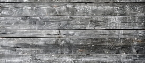 Wall Mural - A textured gray wooden wall with ample space for text, ideal for background use in abstract designs and images requiring copy space.