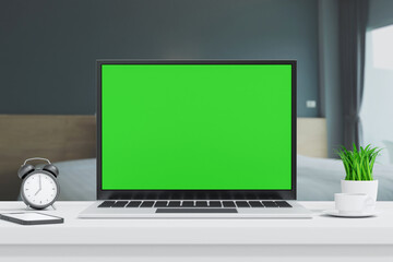 Wall Mural - laptop open to show green screen close up display in bedroom, application website present, 3d render