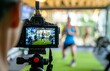 © Ivan - Camera recording a fitness influencer during a workout session in a gym