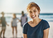 © Stratford/peopleimages.com - Portrait, wind and woman on beach with friends for holiday, travel or vacation in summer together. Nature, relax and smile with happy person in breeze on tropical island coast for bonding or sea