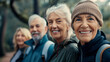 © Tatiana Sdvyzer - Group of elderly friends hiking in the forest, smiling and enjoying nature, healthy lifestyle and outdoor activity in a serene environment.