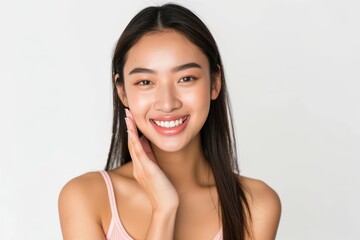 Sticker - a woman with a pink top smiles while holding her hand to her face