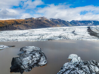 Wall Mural - Aerial beautiful spring day view of Svinafellsjokull Glacier, Iceland. Skaftafell glacier, Vatnajokull National Park in Iceland.