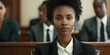 © Anastasiia - A Black female lawyer defends defendants rights in court before a judge. Concept Legal representation, Criminal defense, Justice system, Diversity and inclusion, Courtroom drama