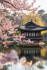 Sticker - A serene hanok by a tranquil pond, cherry blossoms in full bloom and sunlight streaming through the trees, capturing the essence of spring