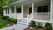 © fotogurme - ''renovation of a home's front porch, new railing and steps being installed, fresh paint, welcoming and modern entrance''