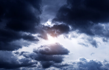 Wall Mural - cloudscape with a light