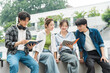 © Q88 - Portrait image of a group of Asian students at university.
