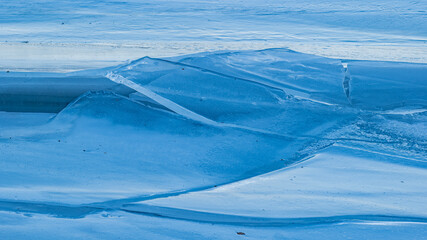 Wall Mural - Frozen ice on the river. Abstract river background