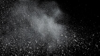 Wall Mural - White dust exploding on a black background