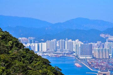 Wall Mural - The view of Hong Kong cityscape from the Peak of Hong Kong. Beautiful and stunning view of Hong Kong. Hong Kong Cityscape and skyline. 