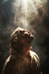 Wall Mural - Man with long hair and a beard wearing a tunic looks up at a radiant light above him