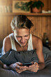 © DoneDeal/peopleimages.com - Relax, happy and man on bed with phone for online chatting, communication and networking. Morning, home and person typing on smartphone for social media, website blog and mobile app in bedroom