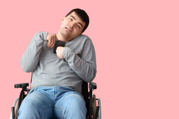 Sticker - Young man in wheelchair on pink background. National Cerebral Palsy Awareness Month