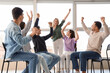 © Pixel-Shot - Happy young people with psychologist at group therapy session
