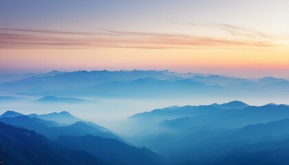 Wall Mural - A panoramic view of a mountain range at dawn, with layers of peaks fading into the distance,