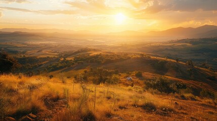 Wall Mural - A scenic campsite on a hilltop overlooking a sprawling valley bathed in the golden light of the setting sun.