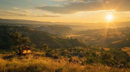 Wall Mural - A scenic campsite on a hilltop overlooking a sprawling valley bathed in the golden light of the setting sun.
