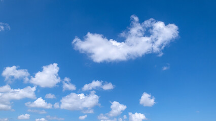 Wall Mural - clear blue sky background,clouds with background, blue sky background with tiny clouds. white fluffy