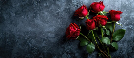 Canvas Print - Valentine's Day card featuring a red rose bouquet on a dark stone backdrop. Overhead view with room for your message.