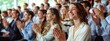 © Evodigger - Applauding people. Happy satisfied audience joyfully applauding during business conference or seminar.