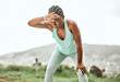 © Oostendorp/peopleimages.com - Fitness, sweat and tired black woman in nature with exercise burnout, challenge or intense body performance. Sports, pause or girl runner outdoor for training, break and breathing, control or fatigue