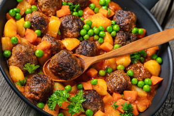 Sticker - turkish meatball stew, sulu kofte, in a pan