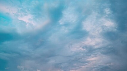 Wall Mural - Movement of changes in clouds and weather conditions in the sky at the dusk