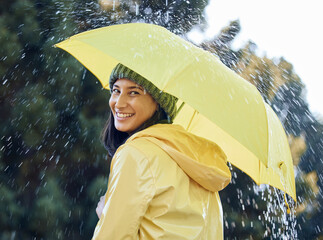 Canvas Print - Umbrella, rain and woman with smile, portrait and carefree in weather of Seattle, travel and explore in vacation. Park, water and girl in raincoat, outdoor and happy in winter, holiday and Washington