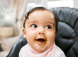 © KayJoint/peopleimages.com - Baby, messy face and food on mouth for eating with growth, hungry and snack for lunch in home. Youth, infant girl and puree on skin for dinner in high chair with development, wellness and nutrition
