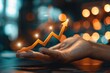 © qorqudlu - An abstract image of a hand interacting with an upward chart, symbolizing growth and success, suitable as a dynamic financial wallpaper