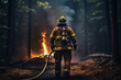 © Veeraphong - Firefighters are holding fire hoses to extinguish forest fires, back view
