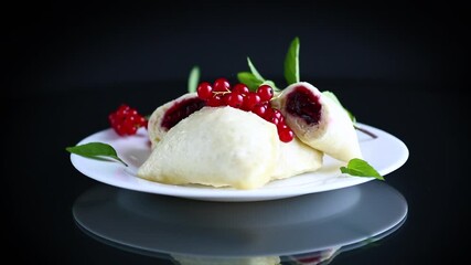 Wall Mural - steamed sweet homemade dumplings with berries, red currants