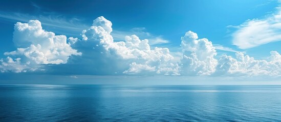 Wall Mural - Serene Blue Sky and Tranquil Ocean