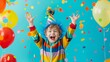 © Nataliia_Trushchenko - A young boy is wearing a colorful striped shirt and a blue hat, and is surrounded by a bunch of balloons. He is jumping up and down and smiling, creating a joyful and festive atmosphere